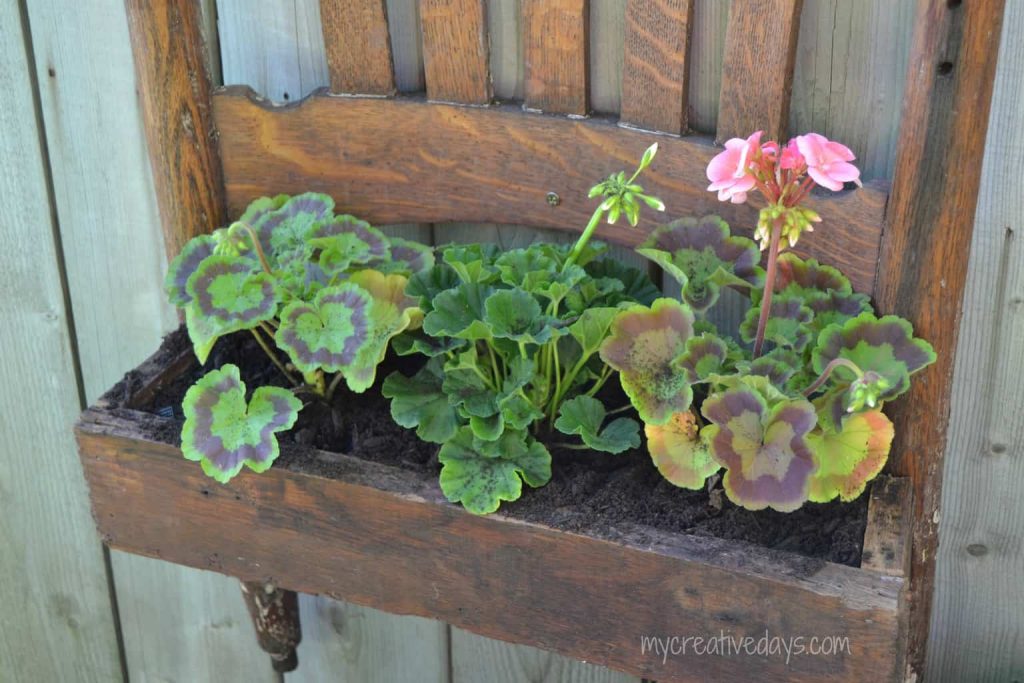 Turn a broken rocking chair into a planter with this easy DIY Rocking Chair Upcycle Project