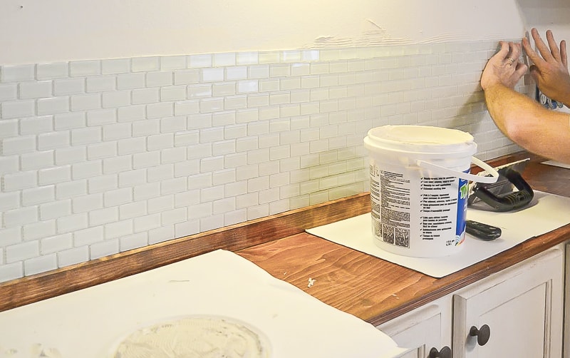 If you want to add a backsplash but have never done it before, this easy DIY Tile Backsplash tutorial is for you.