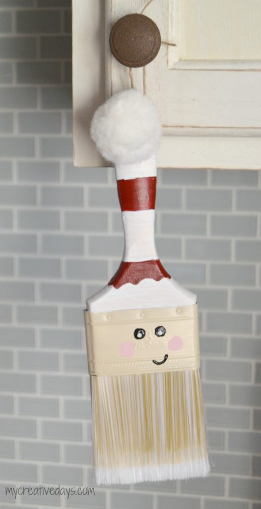 Looking for a fun homemade Christmas ornament idea These Paint Brush Santas are easy and so cute wherever you hang them!