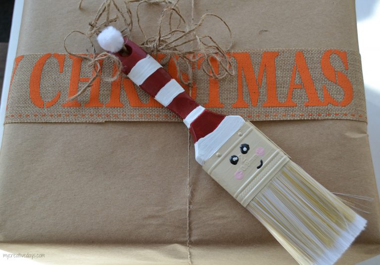 Looking for a fun homemade Christmas ornament idea? These Paint Brush Santas are easy and so cute wherever you hang them!