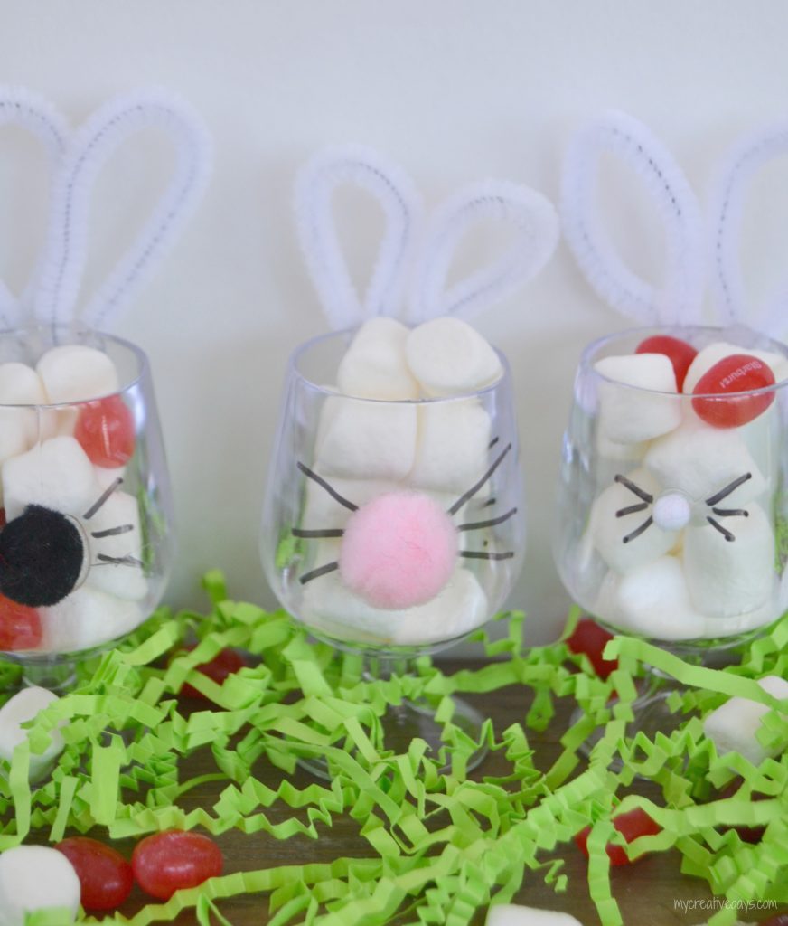 These DIY Bunny Cups To Hold Easter Candy are a cute way to present the kiddos with a little treat on Easter.