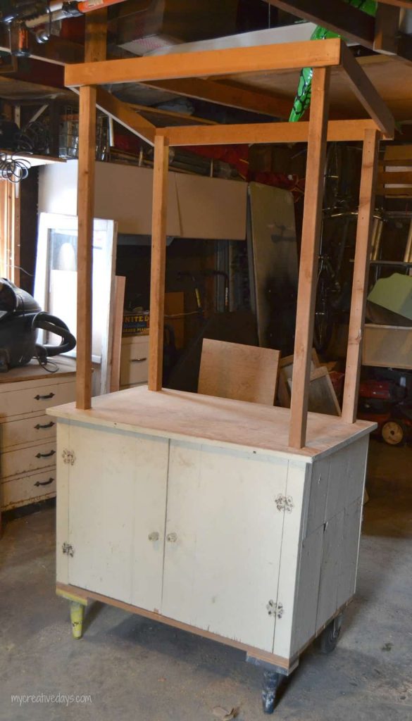 Looking for a lemonade stand for the kids this summer? This DIY Lemonade Stand repurposes an old cabinet into a fun stand for the kids to use for all their lemonade and bake sale stands.