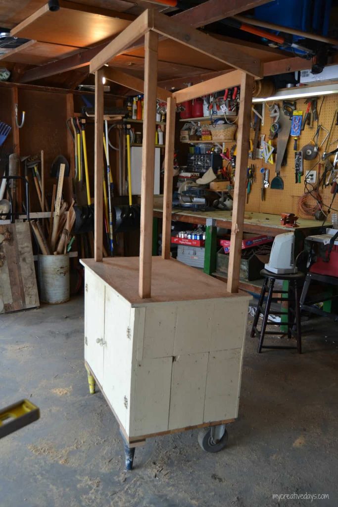 Looking for a lemonade stand for the kids this summer? This DIY Lemonade Stand repurposes an old cabinet into a fun stand for the kids to use for all their lemonade and bake sale stands.