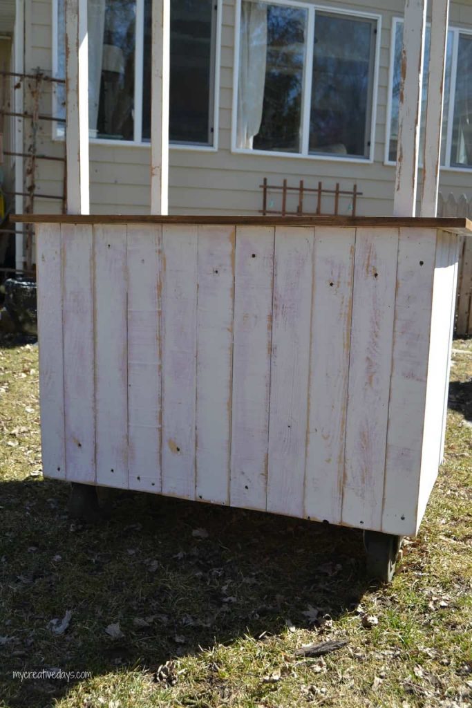 Looking for a lemonade stand for the kids this summer? This DIY Lemonade Stand repurposes an old cabinet into a fun stand for the kids to use for all their lemonade and bake sale stands.