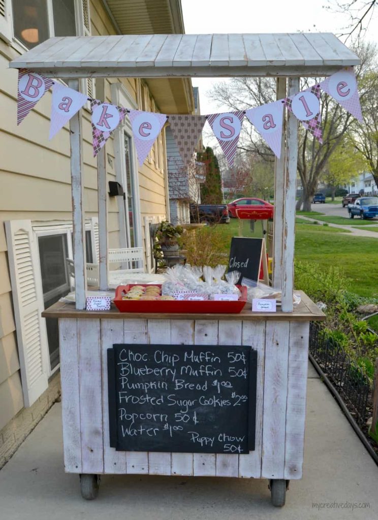 Looking for a lemonade stand for the kids this summer? This DIY Lemonade Stand repurposes an old cabinet into a fun stand for the kids to use for all their lemonade and bake sale stands.