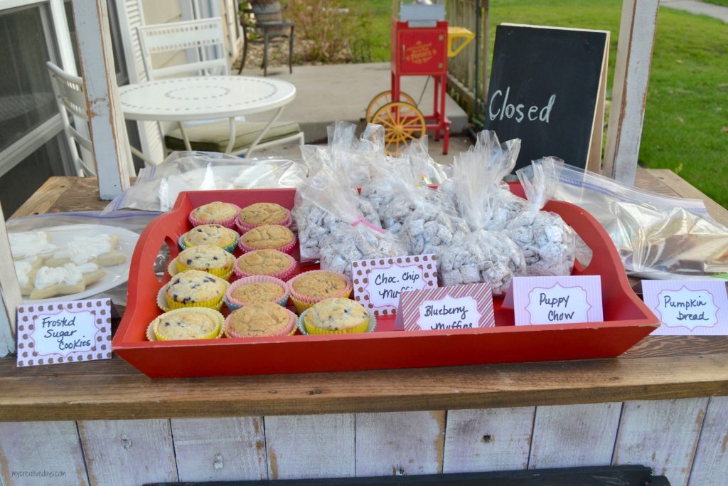 Looking for a lemonade stand for the kids this summer? This DIY Lemonade Stand repurposes an old cabinet into a fun stand for the kids to use for all their lemonade and bake sale stands.