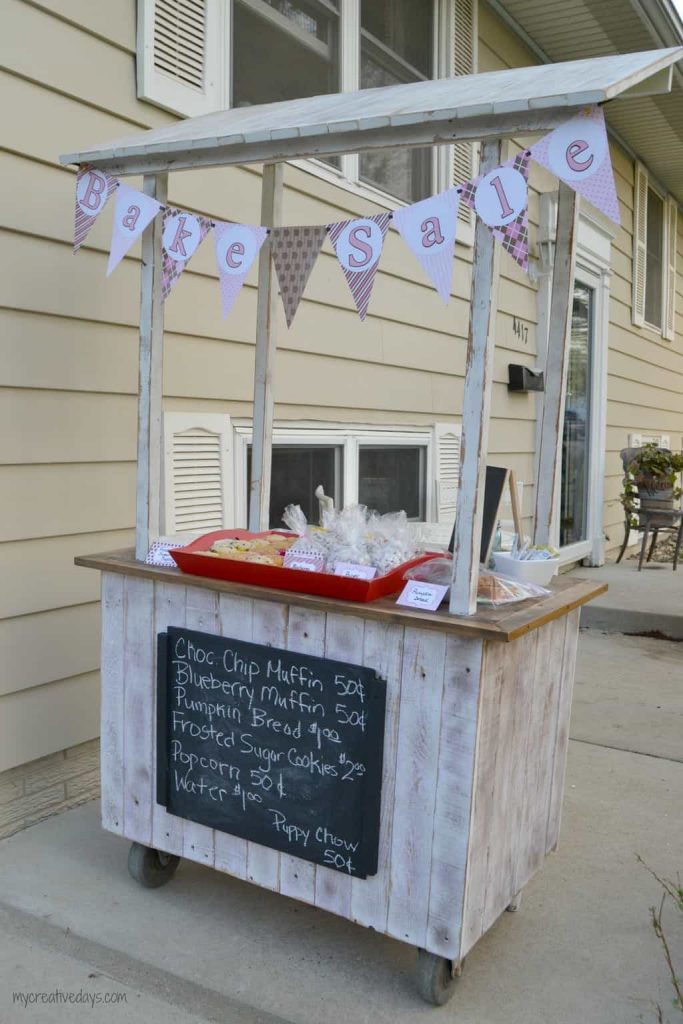 Looking for a lemonade stand for the kids this summer? This DIY Lemonade Stand repurposes an old cabinet into a fun stand for the kids to use for all their lemonade and bake sale stands.