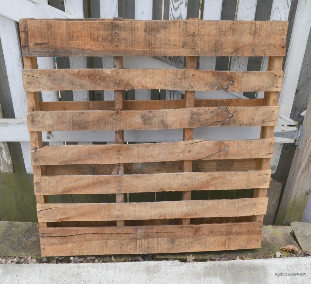 This Reclaimed Pallet Wood Organizer is easy to make and can be used to organize all kinds of things in your home.