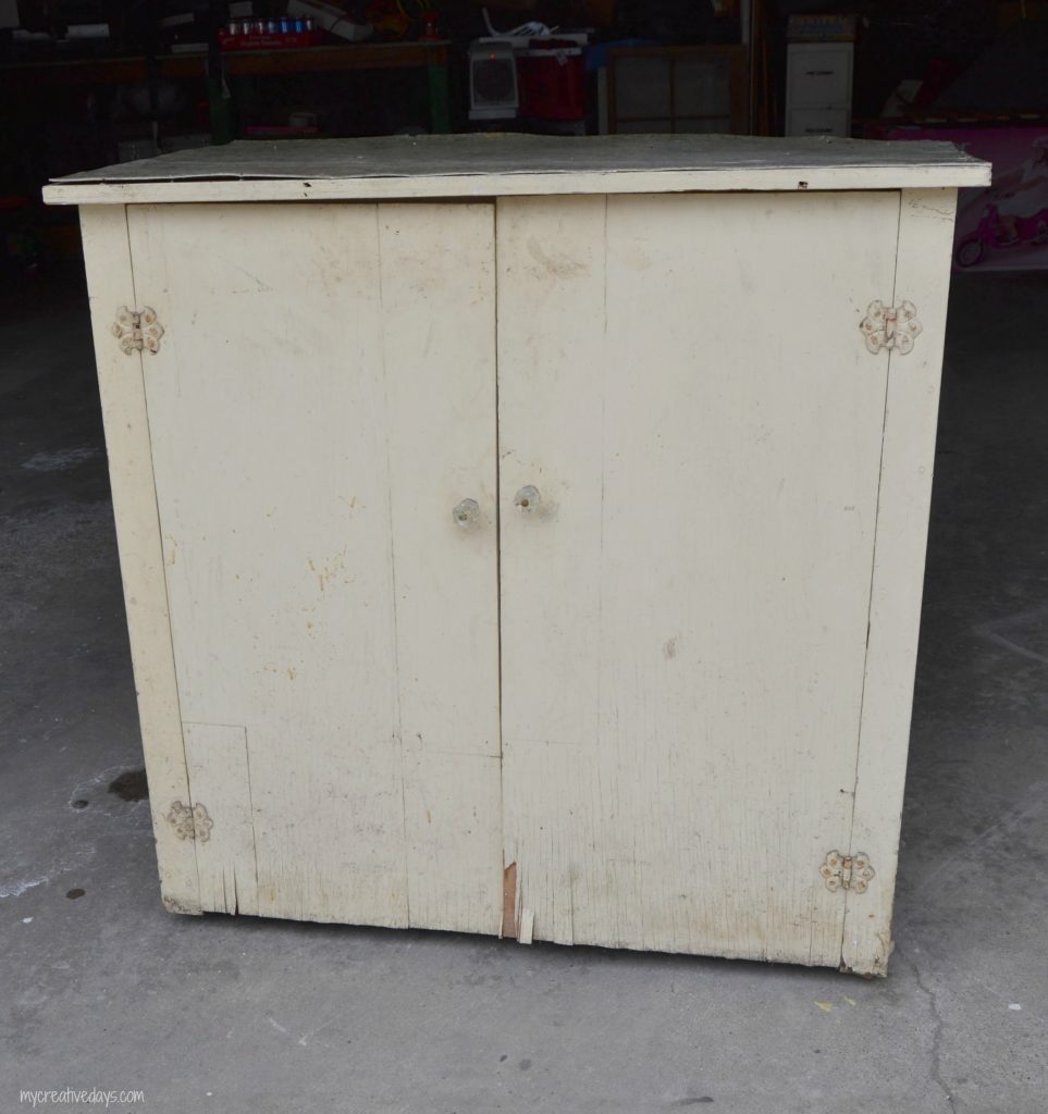 Looking for a lemonade stand for the kids this summer? This DIY Lemonade Stand repurposes an old cabinet into a fun stand for the kids to use for all their lemonade and bake sale stands.