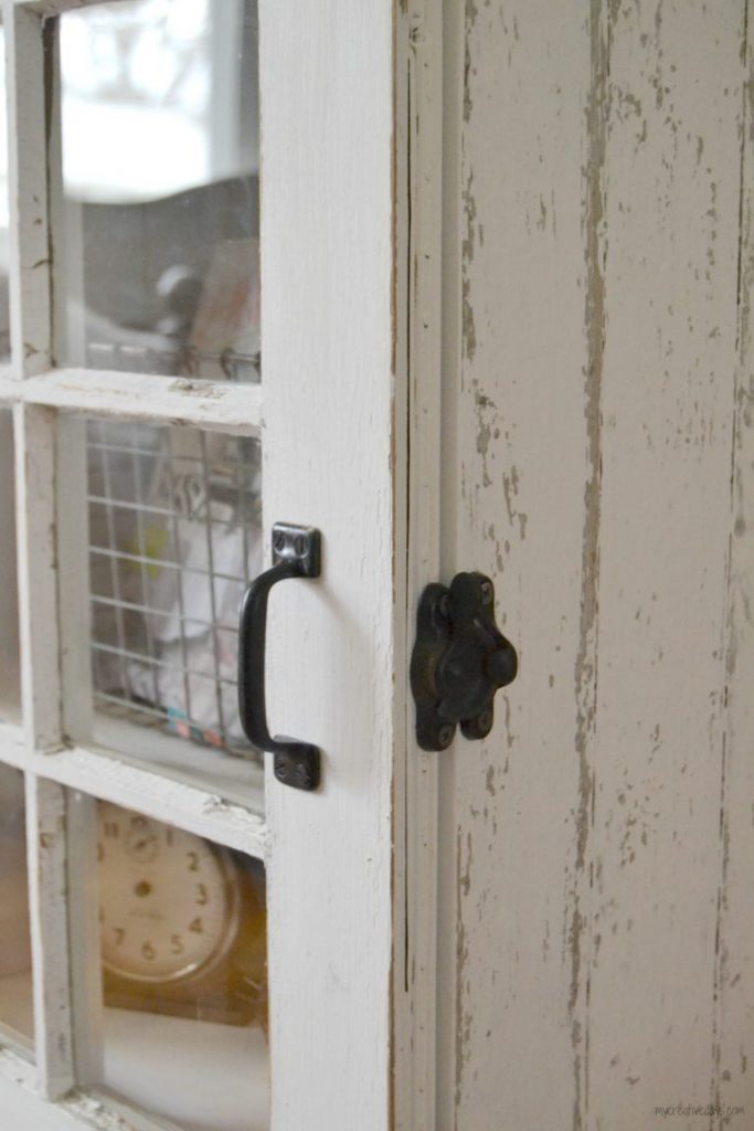 Do you love old windows and have a few on hand? Make a DIY Window Cabinet to make them functional and highlight them in a new way!