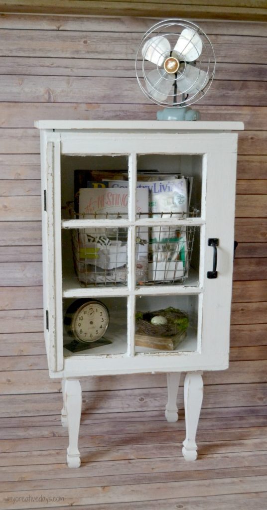 Do you love old windows and have a few on hand? Make a DIY Window Cabinet to make them functional and highlight them in a new way!