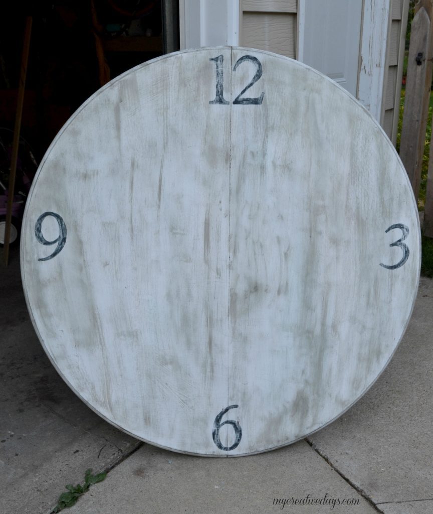 Are you looking for an outdoor wall clock? This DIY outdoor wall clock is made from a repurposed table top and is the perfect addition to your outdoor space or garden. 