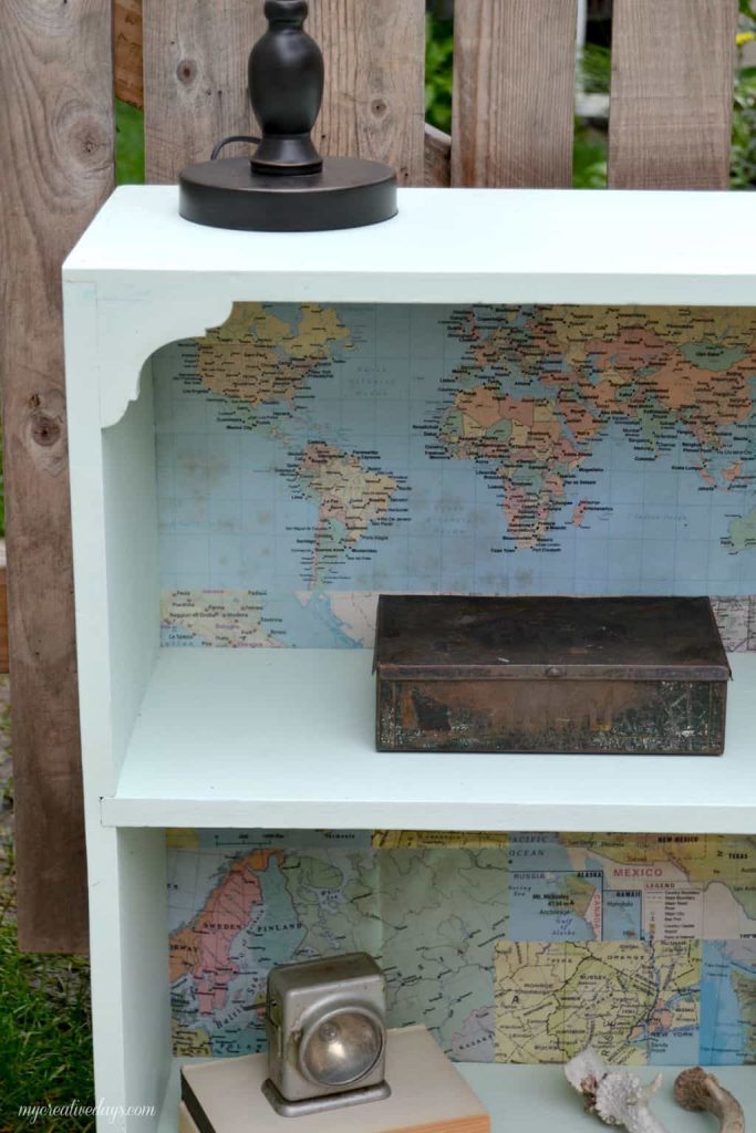 Do you have an old bookshelf that has seen better days? Spruce it up! This bookshelf makeover turned a blah bookshelf into a beautiful piece!