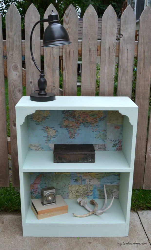 Do you have an old bookshelf that has seen better days? Spruce it up! This bookshelf makeover turned a blah bookshelf into a beautiful piece!