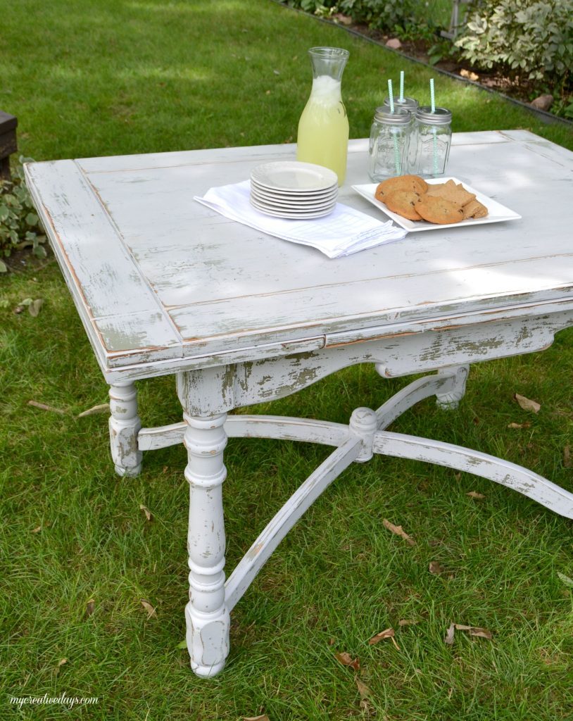 Farmhouse tables come in all shapes, colors and sizes. This small farmhouse table was an avocado green color, but we toned it down and made it chippy with touches of the green color popping through.