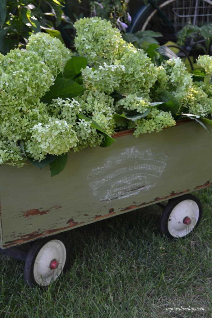 Wagons come in all shapes and sizes and this DIY wagon tutorial will show you how to turn your basic wagon into a beautiful piece for your garden or porch!