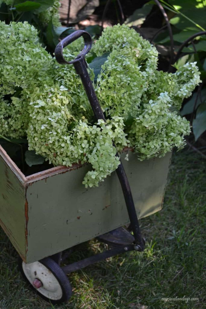 Wagons come in all shapes and sizes and this DIY wagon tutorial will show you how to turn your basic wagon into a beautiful piece for your garden or porch!