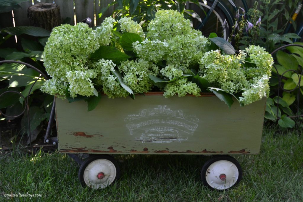 Wagons come in all shapes and sizes and this DIY wagon tutorial will show you how to turn your basic wagon into a beautiful piece for your garden or porch!