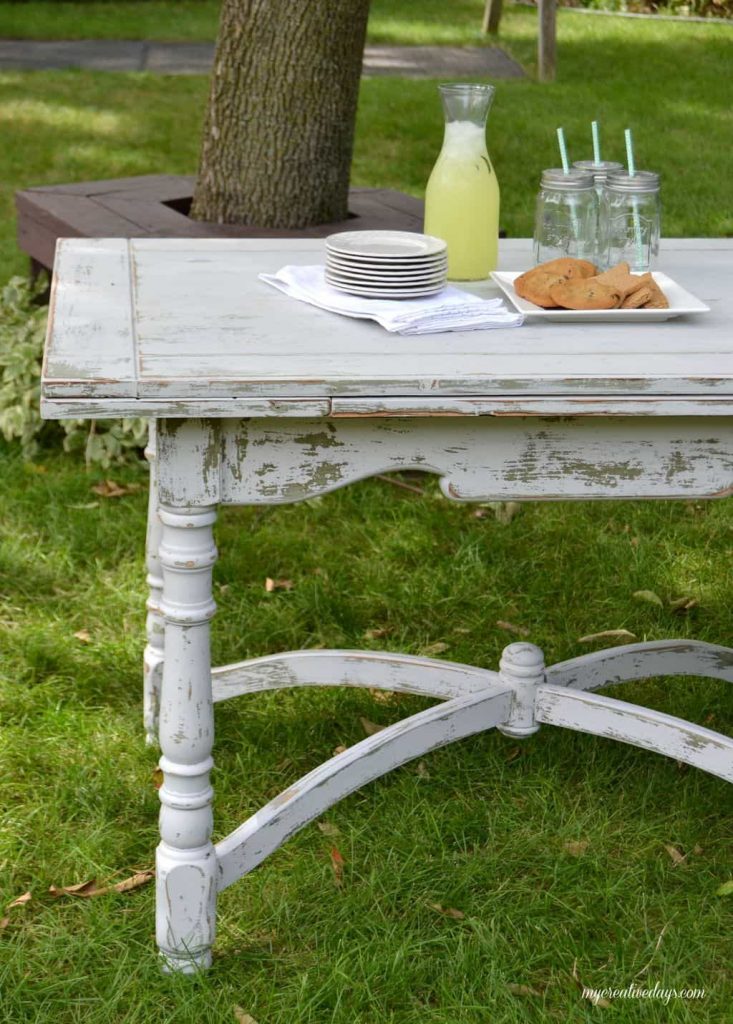 Farmhouse tables come in all shapes, colors and sizes. This small farmhouse table was an avocado green color, but we toned it down and made it chippy with touches of the green color popping through.