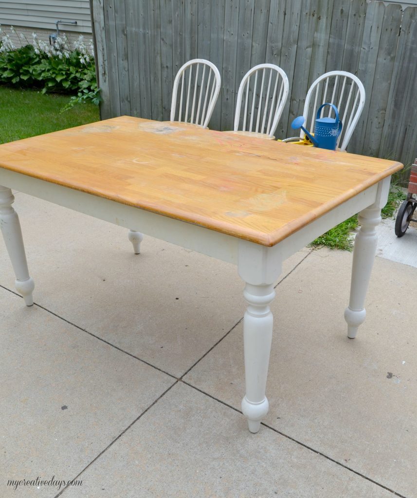 Are you looking for a farmhouse kitchen table and chairs? Search local yard sales and customize a set like we did with this one. 
