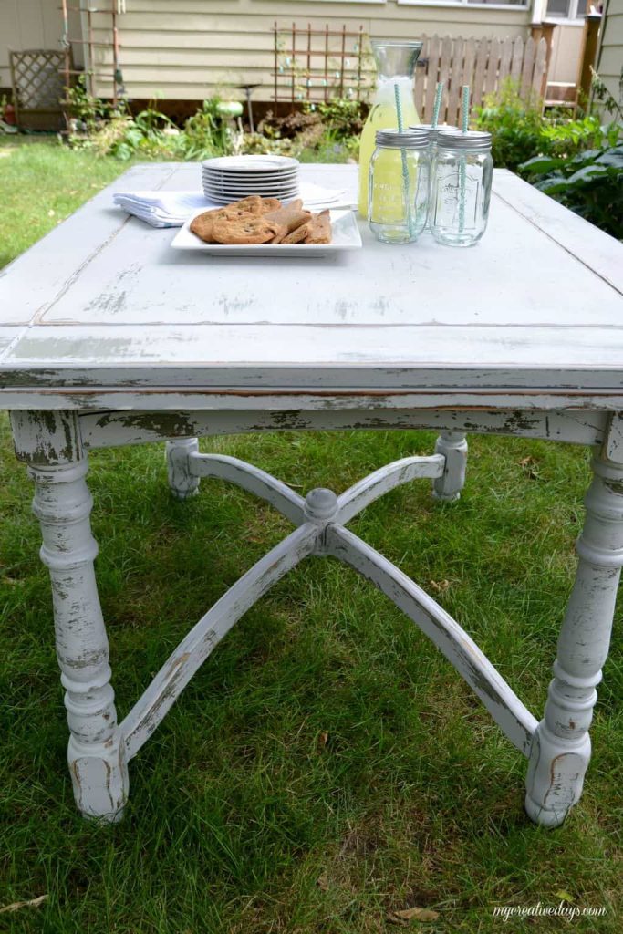 Farmhouse tables come in all shapes, colors and sizes. This small farmhouse table was an avocado green color, but we toned it down and made it chippy with touches of the green color popping through.