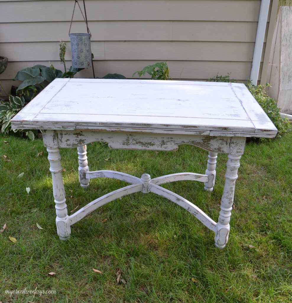 Farmhouse tables come in all shapes, colors and sizes. This small farmhouse table was an avocado green color, but we toned it down and made it chippy with touches of the green color popping through.