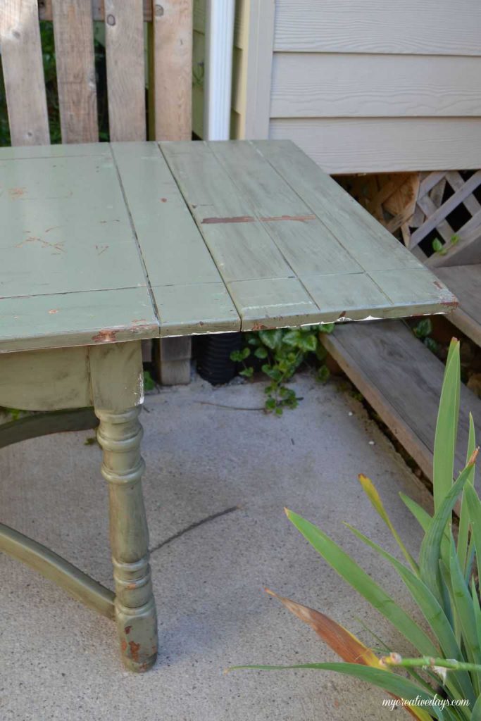 Farmhouse tables come in all shapes, colors and sizes. This small farmhouse table was an avocado green color, but we toned it down and made it chippy with touches of the green color popping through.