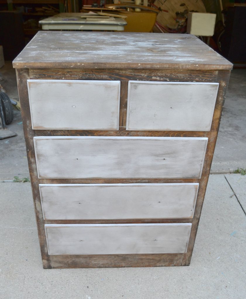 Are you looking for some inspiration to make over a small chest drawers you have? This White Chest Dresser Makeover took an old kitchen cabinet and transformed it into a rustic piece that would fit many different styles. 