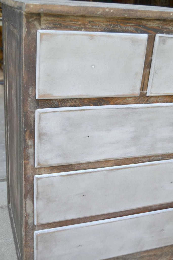 Are you looking for some inspiration to make over a small chest drawers you have? This White Chest Dresser Makeover took an old kitchen cabinet and transformed it into a rustic piece that would fit many different styles. 