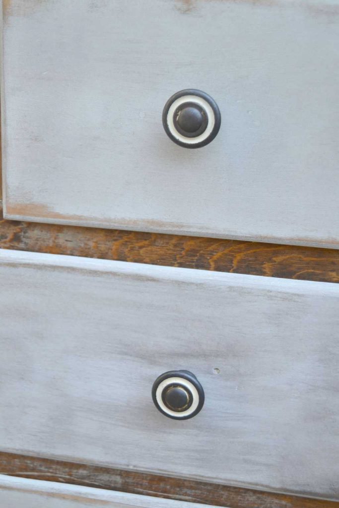 Are you looking for some inspiration to make over a small chest drawers you have? This White Chest Dresser Makeover took an old kitchen cabinet and transformed it into a rustic piece that would fit many different styles. 