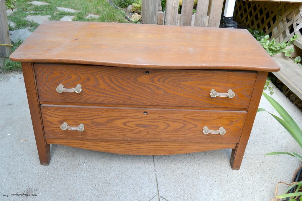 Do you have a small dresser that is in need of a makeover? This small black dresser makeover was so easy to do and I was able to salvage the vintage glass pulls!