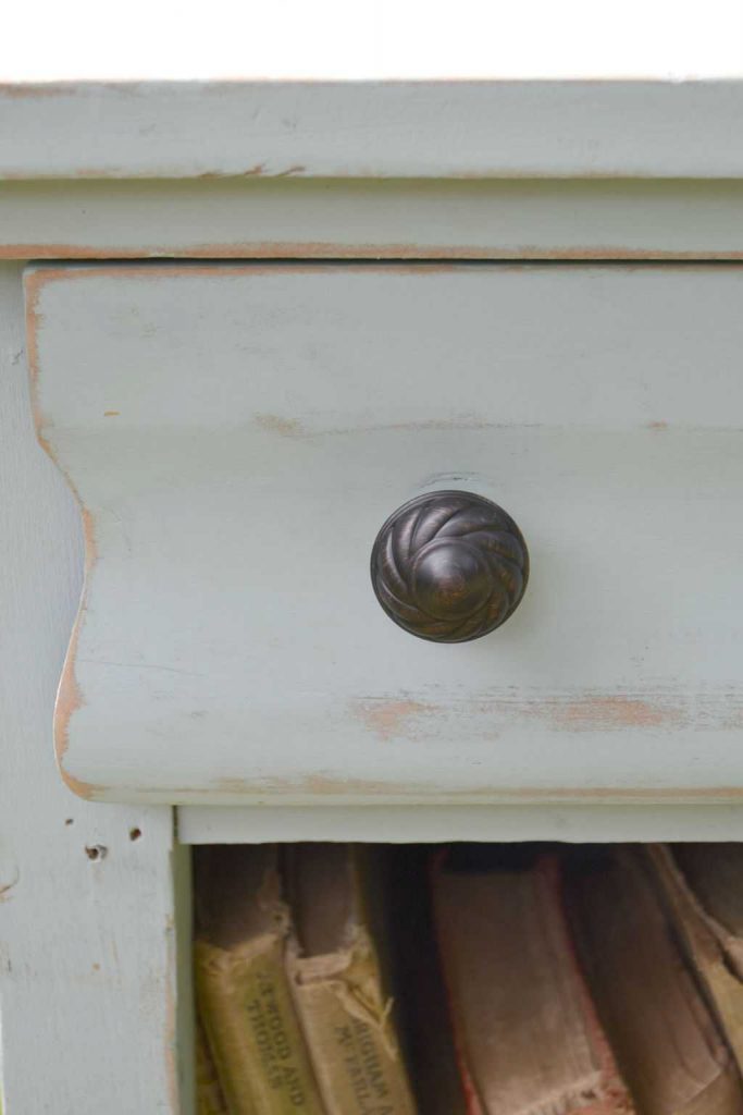 Do you like french country decor, but don't want to spend the money to get it? DIY your own French Country furniture with a little paint and some elbow grease! This cabinet now has a French country flair!