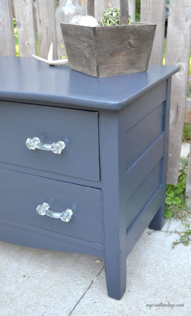 Do you have a small dresser that is in need of a makeover? This small black dresser makeover was so easy to do and I was able to salvage the vintage glass pulls!