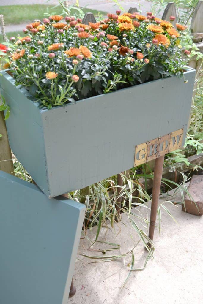 Are you looking for a wooden planter box? DIY your own! Search around in your garage for supplies you may have on hand and create the exact wooden planter box you are looking for!