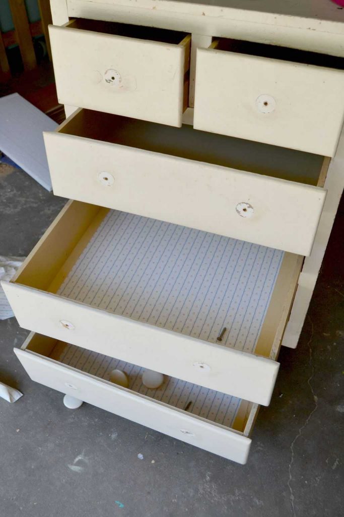 Are you looking for some inspiration to make over a small chest drawers you have? This White Chest Dresser Makeover took an old kitchen cabinet and transformed it into a rustic piece that would fit many different styles. 