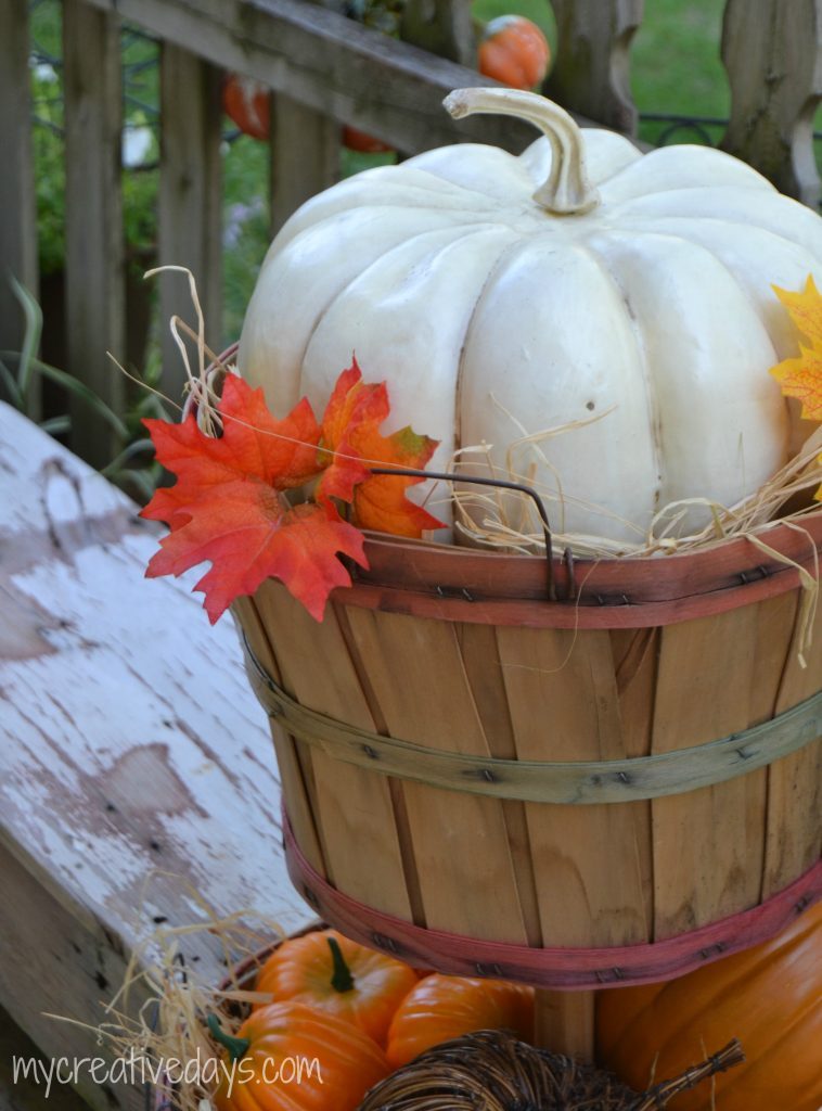 If you are looking for easy DIY Fall Decor Tutorial for your home, click over to see how to make this cute tiered bushel basket to fill with pumpkins and gourds.