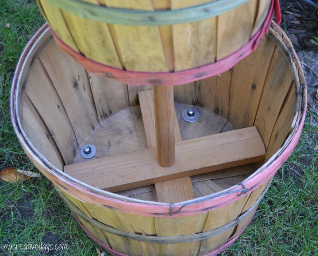 If you are looking for easy DIY Fall Decor Tutorial for your home, click over to see how to make this cute tiered bushel basket to fill with pumpkins and gourds.