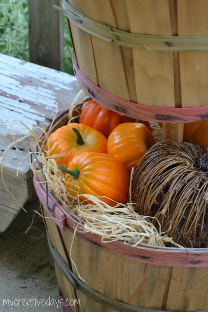 If you are looking for easy DIY Fall Decor Tutorial for your home, click over to see how to make this cute tiered bushel basket to fill with pumpkins and gourds.