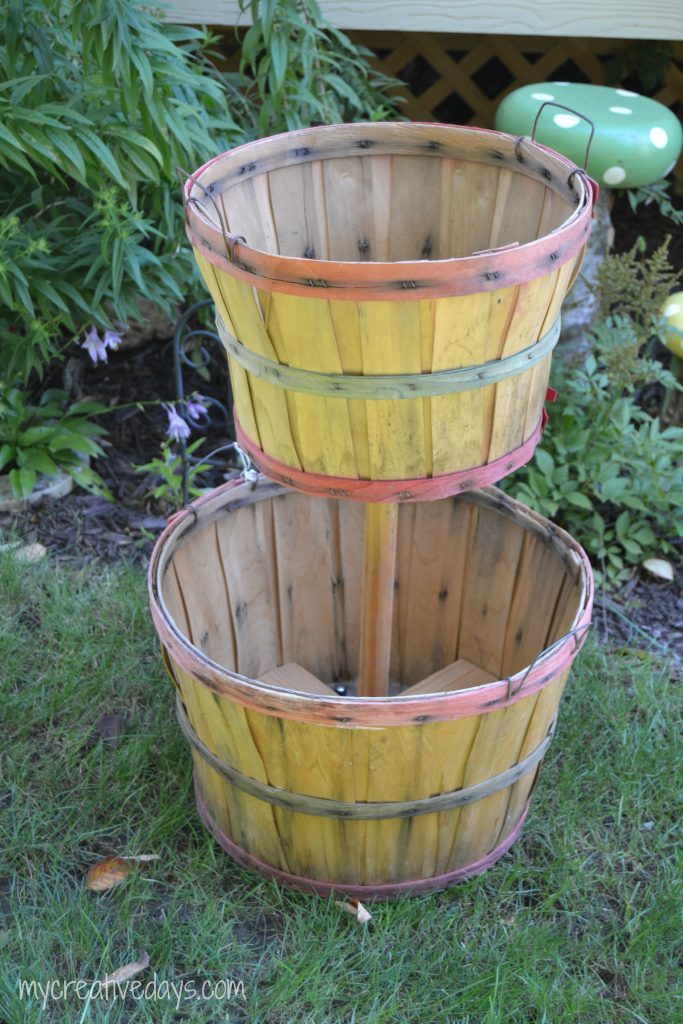 If you are looking for easy DIY Fall Decor Tutorial for your home, click over to see how to make this cute tiered bushel basket to fill with pumpkins and gourds.