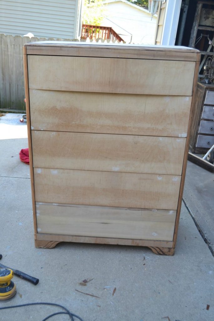 Are you looking for a way to make over an old dresser you have? Click over to see how to take a worn down dresser and make it a stunning piece for your home. 