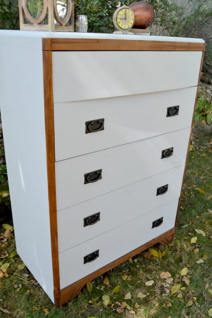 Are you looking for a way to make over an old dresser you have? Click over to see how to take a worn down dresser and make it a stunning piece for your home. 