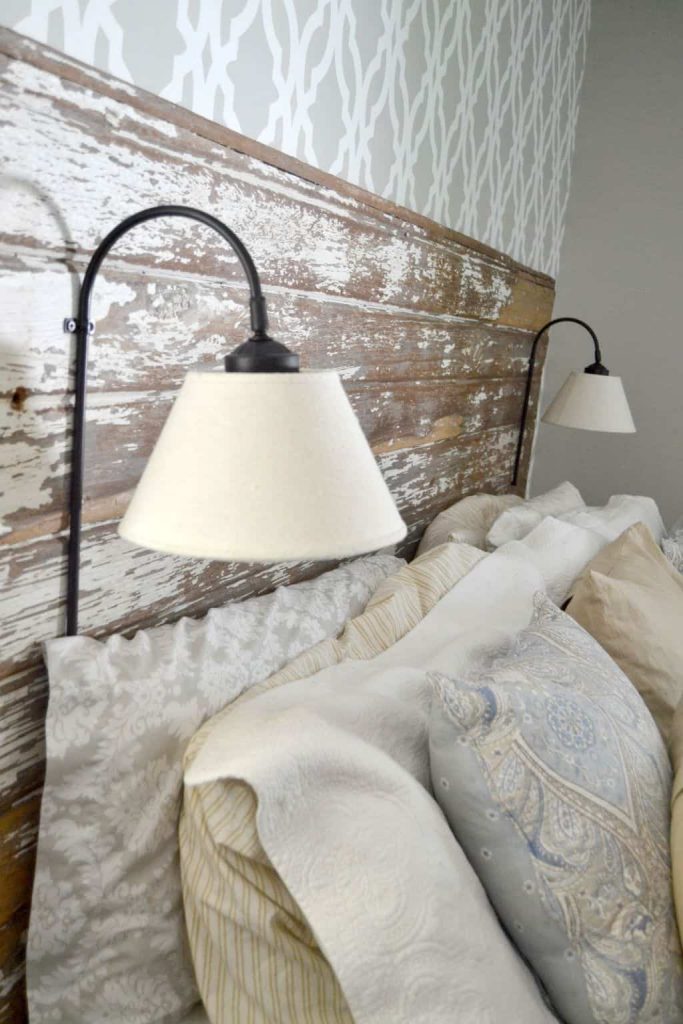 If you would like to free up some space on your night stands, click over to see how to make a DIY Plug In Wall Sconce for your headboard. 