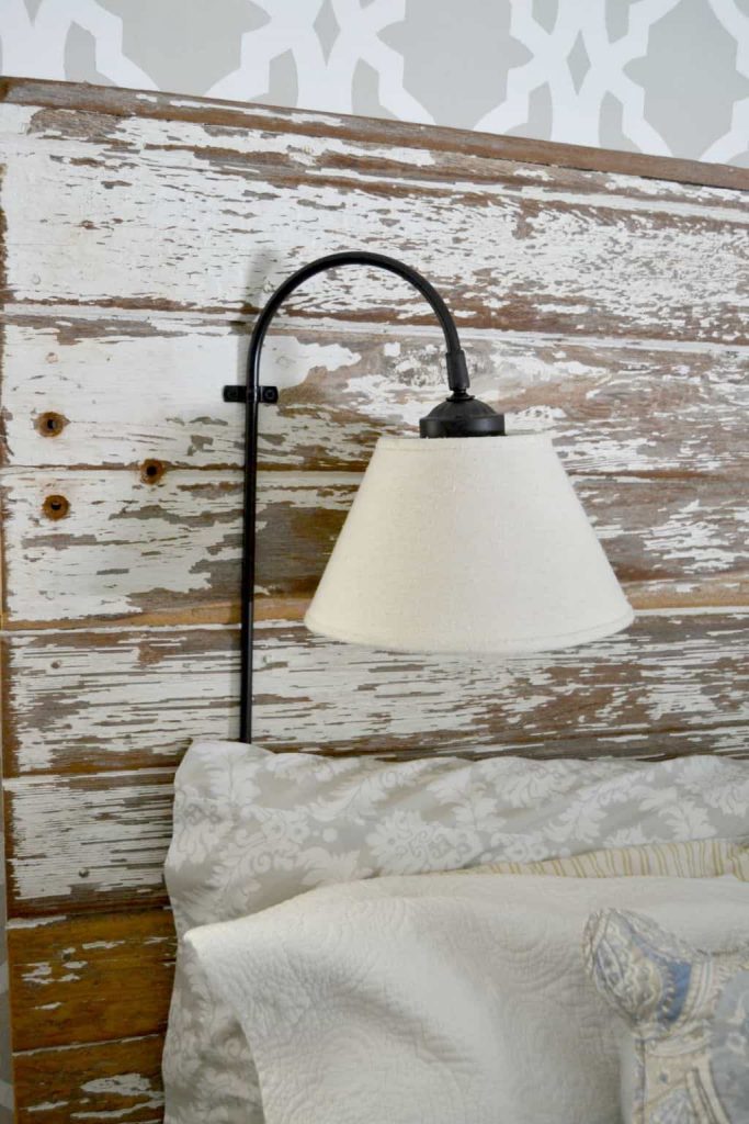 If you would like to free up some space on your night stands, click over to see how to make a DIY Plug In Wall Sconce for your headboard. 
