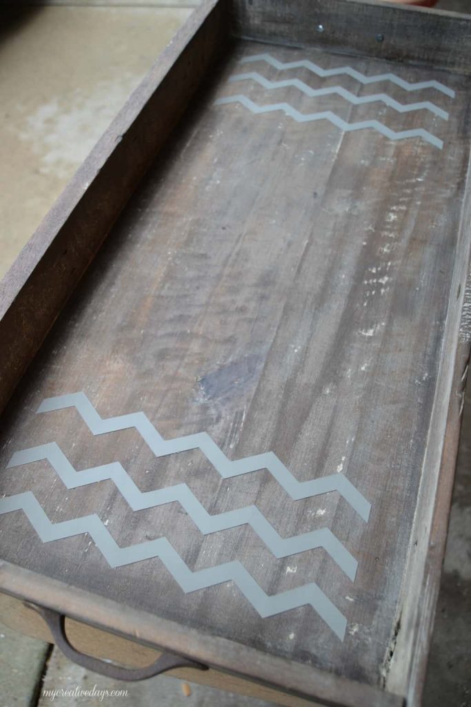 Are you looking for a wooden tray for your home? Don't waste your money on one in the store. Click over to see how easy it is to DIY a wooden tray!