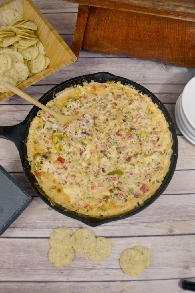 Looking for a cheesy dip to serve at your next party? Click over to get this easy for a Zesty Sausage Cream Cheese Dip your guests will love!