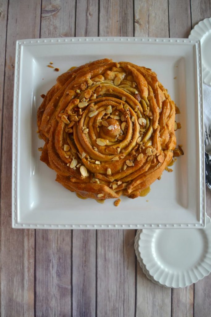 This Easy Almond Sticky Bun Recipe is a delicious new take on the traditional sticky bun recipe. Click over to get your family's new favorite breakfast and brunch recipe. 