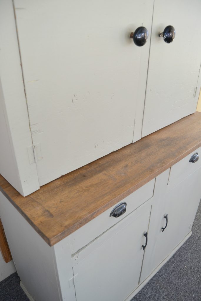 If you love farmhouse furniture and you want to add it to you home, click over to see how this garage cabinet became a farmhouse hutch in a few steps. 