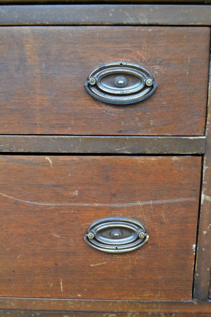 If you have an antique buffet that is in need of a makeover, click over to see how easy it was to transform this antique buffet into a white distressed show stopper!