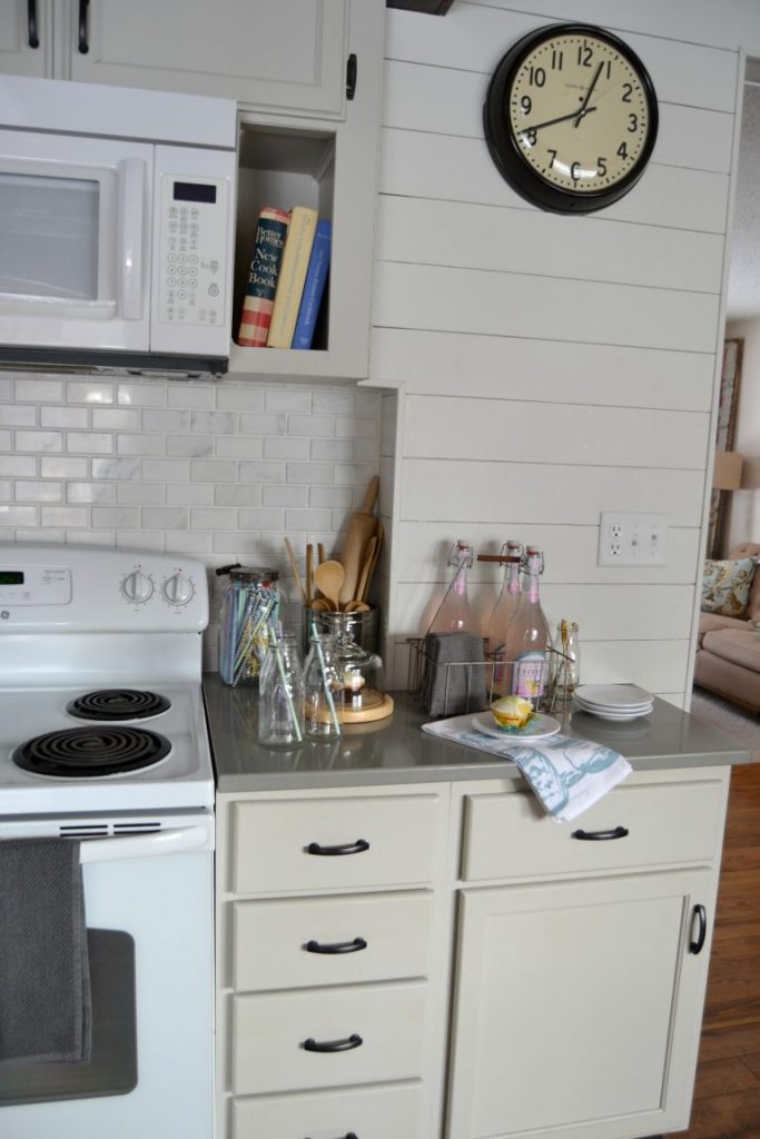 If you would like to change the look of your kitchen, but have a tight budget to work with, click over to see how we saved a lot of money on this DIY Kitchen Makeover!