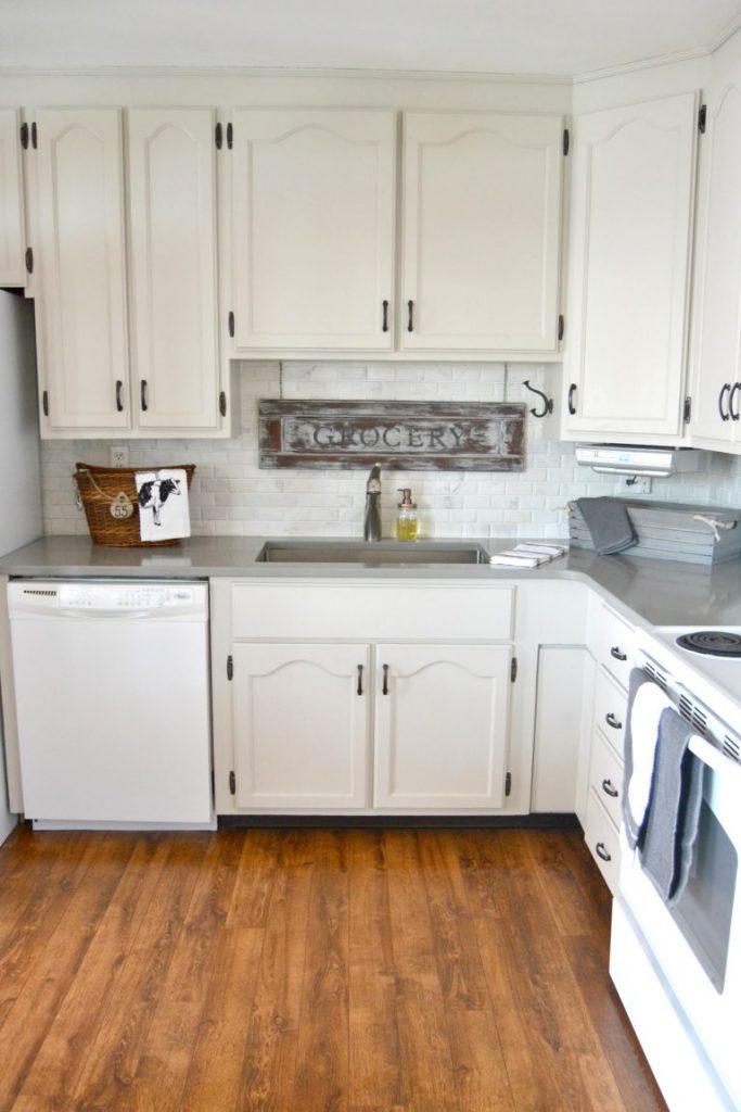 If you would like to change the look of your kitchen, but have a tight budget to work with, click over to see how we saved a lot of money on this DIY Kitchen Makeover!